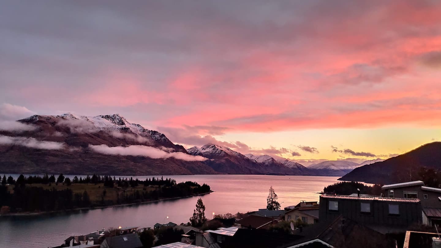 Sunset over Lake Wakatipu and the mountains from Panorama Haven